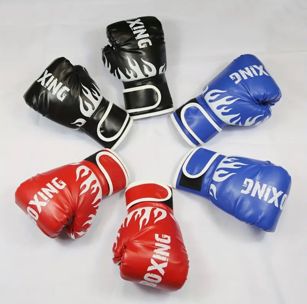 black, blue and red youth boxing gloves