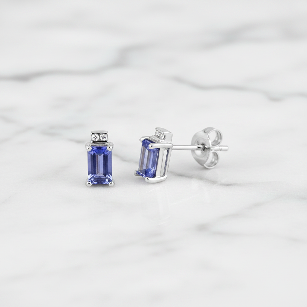 9ct White Gold Diamond & Tanzanite Stud Earrings on Marble