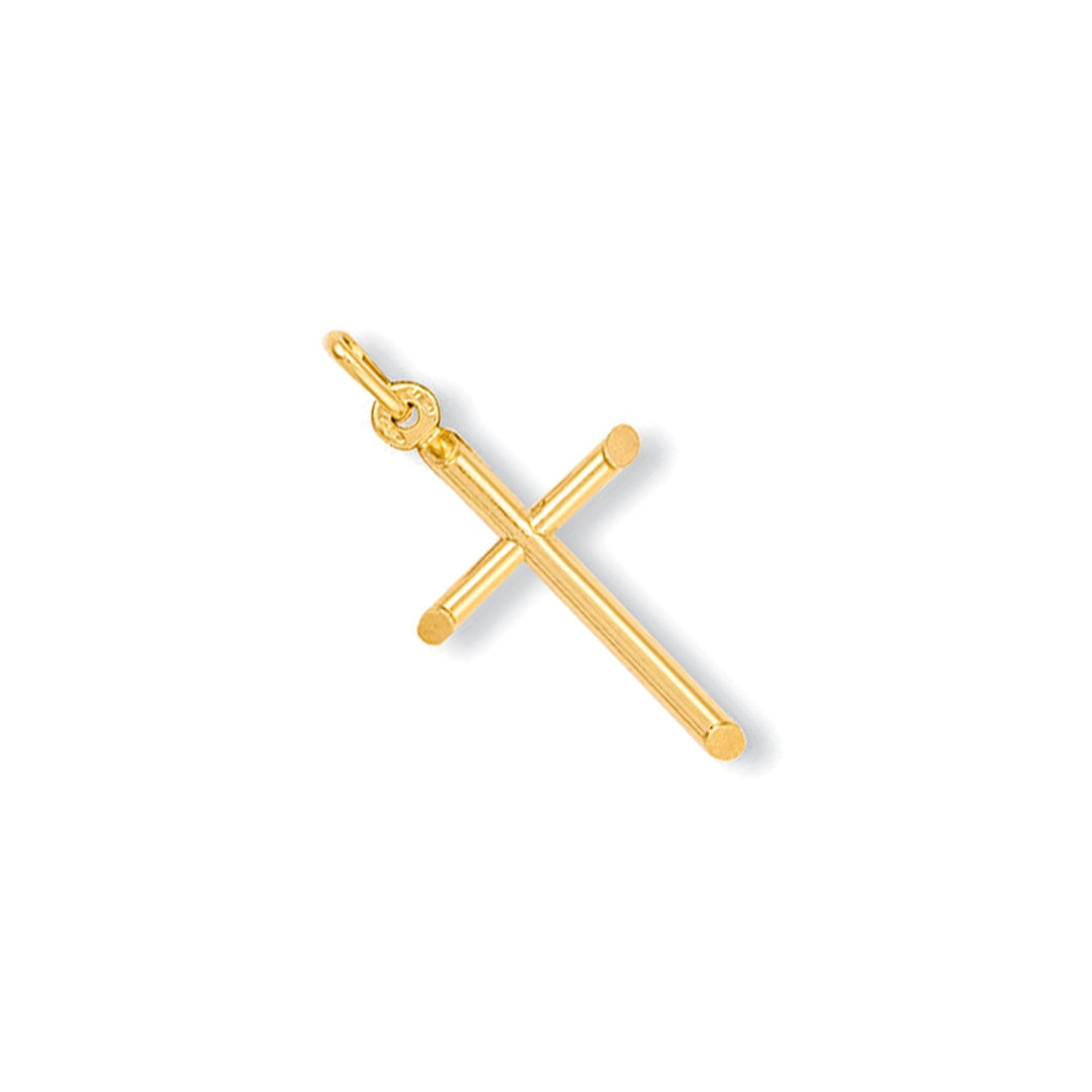 Gold cross pendant on a white background