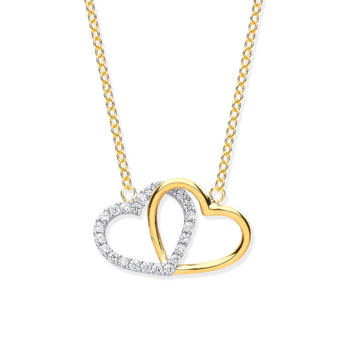 Gold and white gold heart-shaped pendant necklace on a white background