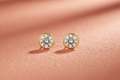 9ct Yellow Gold 5mm Rubover Set CZ Stud Earrings on coral textured background