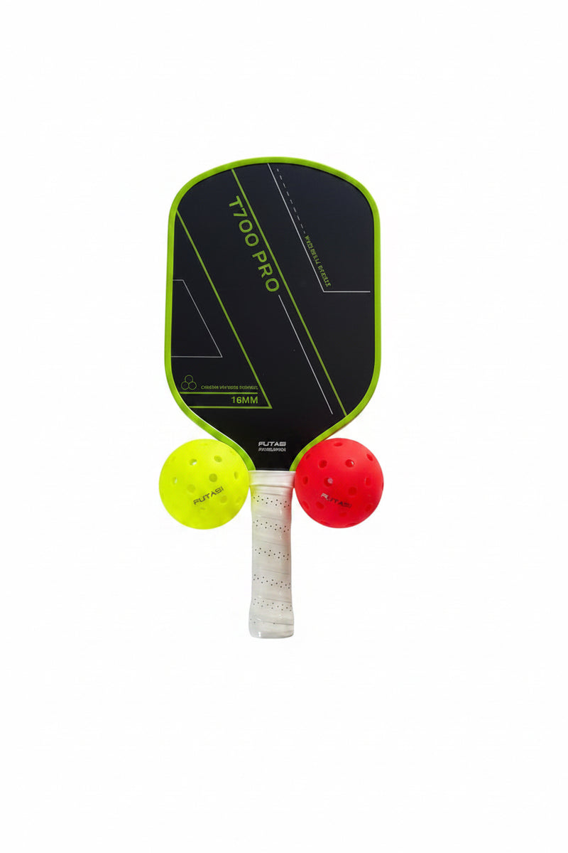 Pickleball paddle with two balls on a light gray surface T700 FUTASI