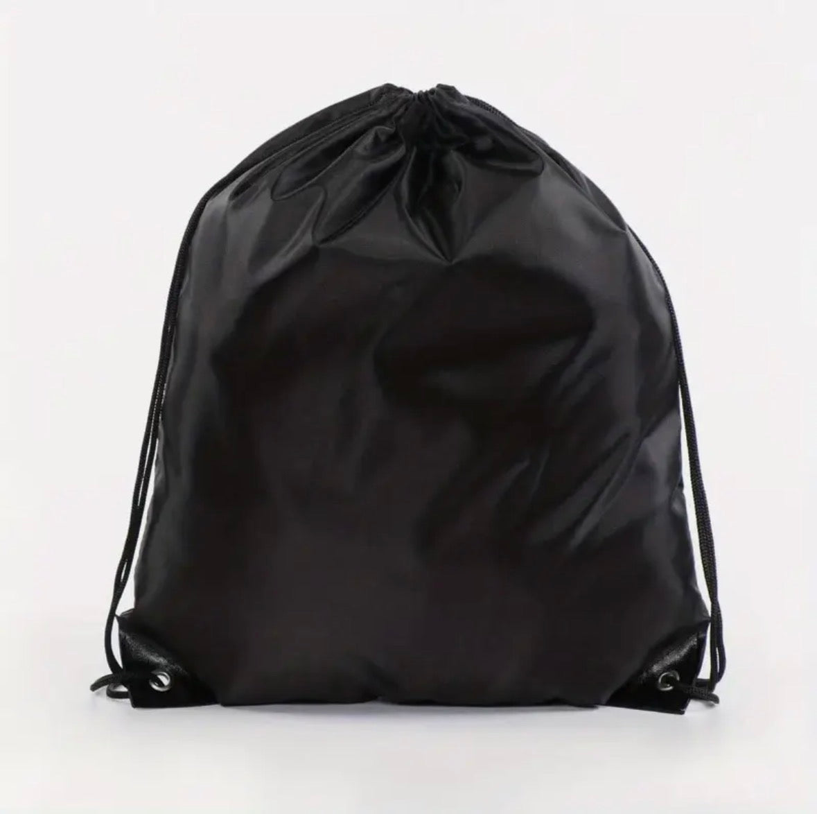 Black drawstring bag on a white background