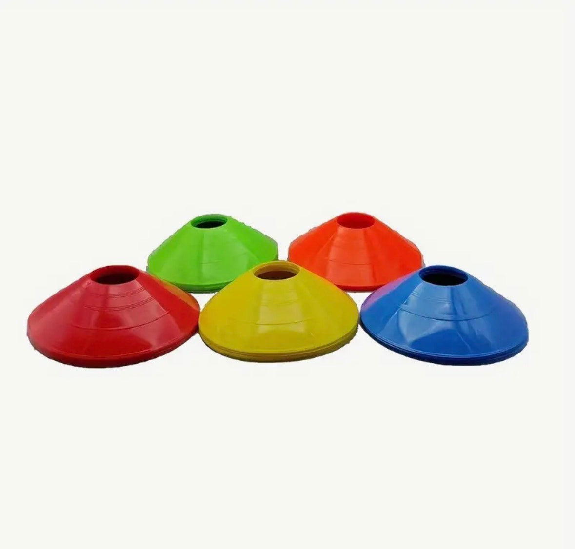 Set of colorful plastic cones on a white background