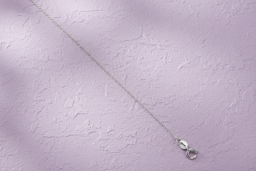 9ct White Gold 0.8mm Diamond Cut Trace Chain on lavender textured background