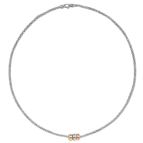 Silver necklace with three colored pendants on a white background