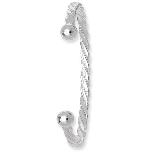 Silver twisted earring on a white background