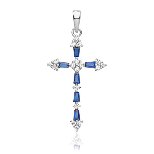 Silver cross pendant with blue gemstones on a white background