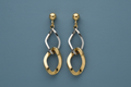 9ct Yellow & White Gold Fancy Drop Earrings on slate blue textured background