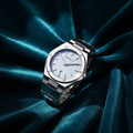 Herbelin Cap Camarat 14545B25 ladies watch on ocean teal velvet background