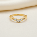 9ct Yellow Gold 0.15ct Diamond Wishbone Ring on soft ivory textured background