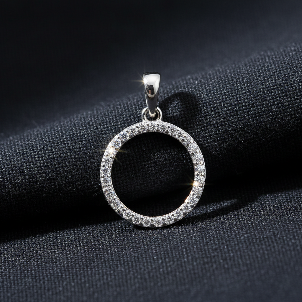 Silver Rhodium CZ Circle Pendant on charcoal grey fabric background