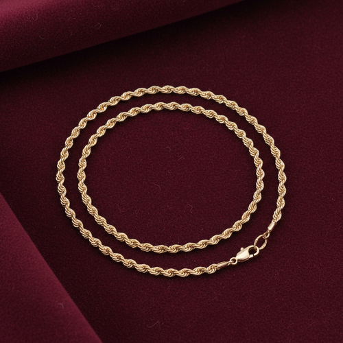 9ct Gold Hollow Rope Style Anklet on burgundy textured background