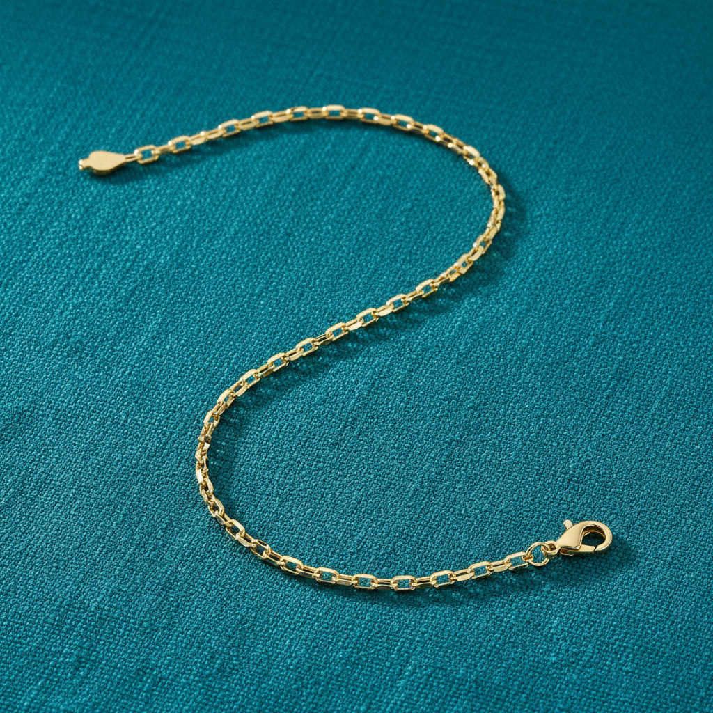 9ct Yellow Gold Hollow Diamond Cut Belcher Anklet on teal textured background
