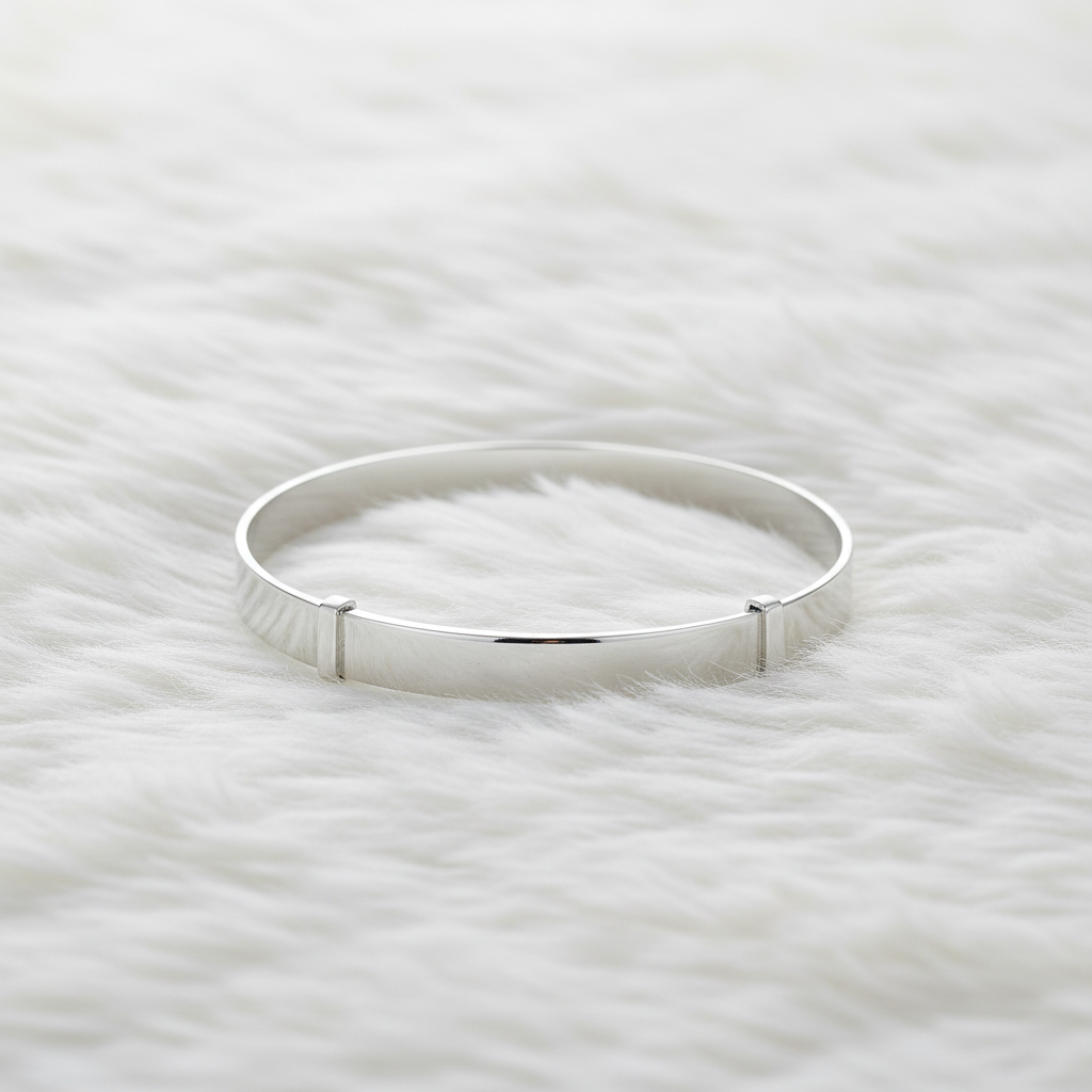 Silver Round Babies Plain Expandable Bangle on soft white fluffy background