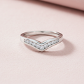 9ct White Gold 0.25ct Diamond Wishbone Ring on soft blush pink textured background