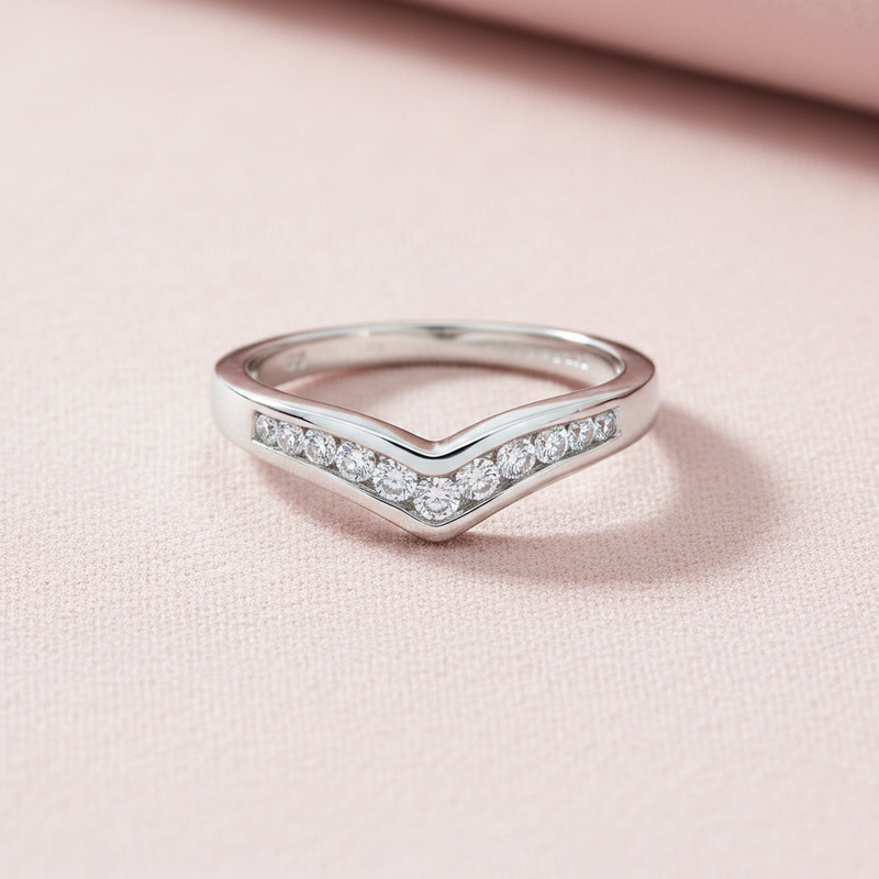 9ct White Gold 0.25ct Diamond Wishbone Ring on soft blush pink textured background