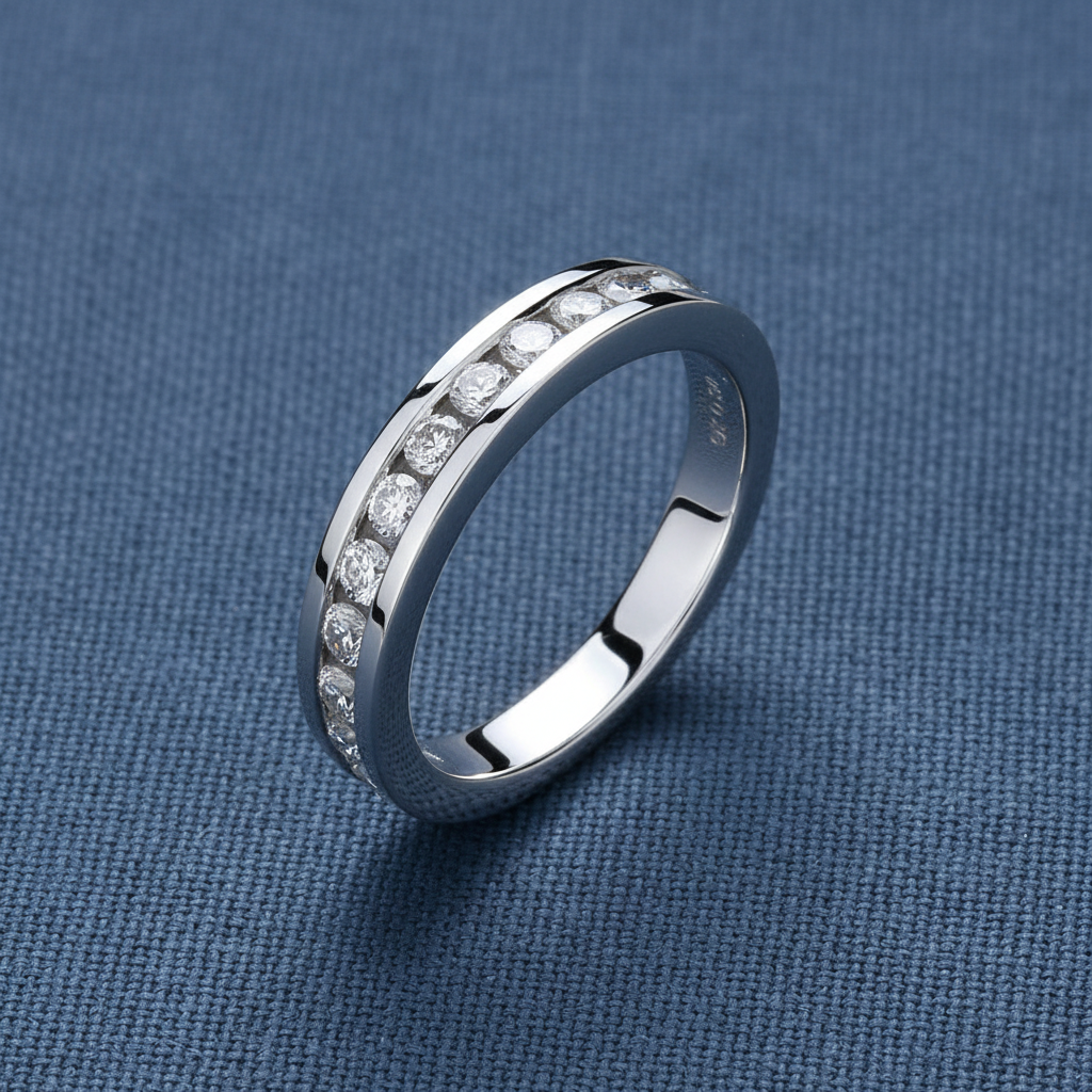 9ct White Gold 0.50ct Diamond Eternity Ring 12 Stone on slate blue textured background