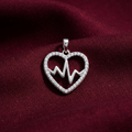 Silver Rhodium Heart Beat Pendant on textured burgundy fabric background