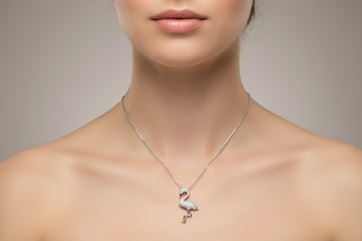 Silver rhodium plated CZ flamingo pendant worn on a woman's neck