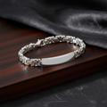 Silver Mens Byzantine ID Bracelet with lobster clasp on dark styled background