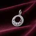 Silver Double Circle CZ Pendant on textured burgundy fabric background