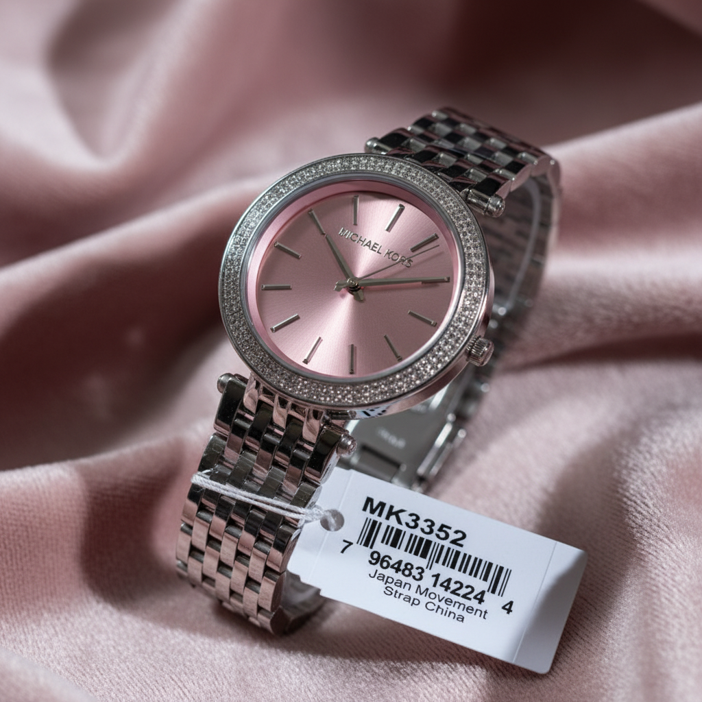 Michael Kors MK3352 silver watch with pink dial on rose textured background