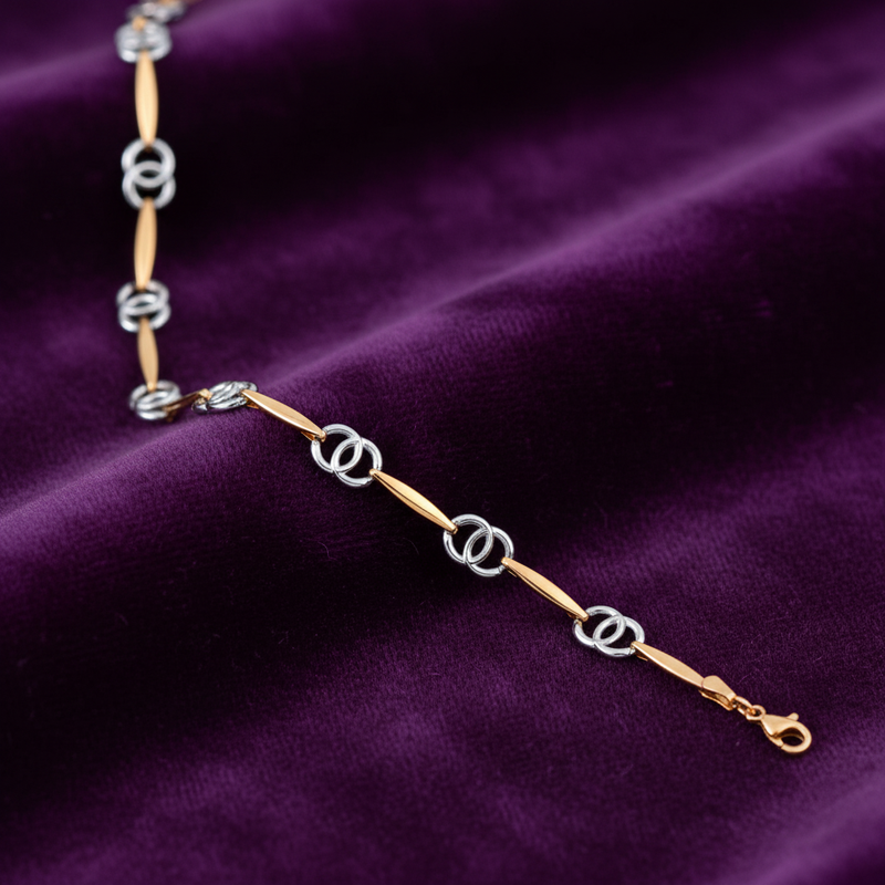 9ct White & Yellow Gold Interlocking Circles Ladies Bracelet on purple velvet background