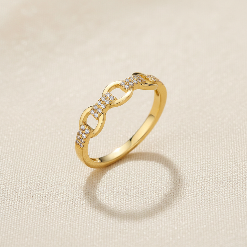 9ct Yellow Gold 0.10ct Diamond Ring on champagne cream textured background