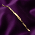 9ct Yellow Gold Curb ID Ladies Bracelet on purple velvet background