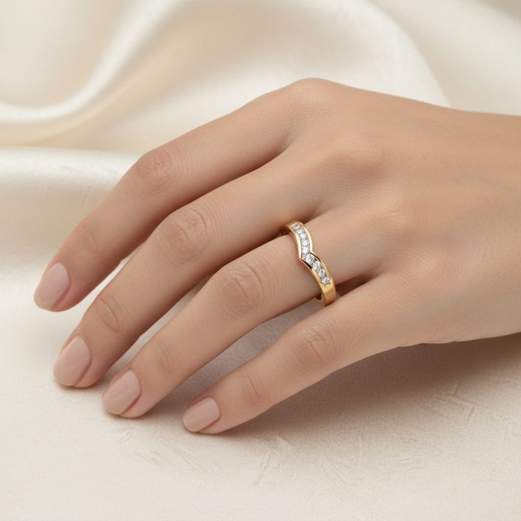 9ct Yellow Gold 0.15ct Diamond Wishbone Ring worn on a ladies hand