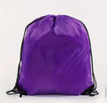 Purple drawstring bag on a white background