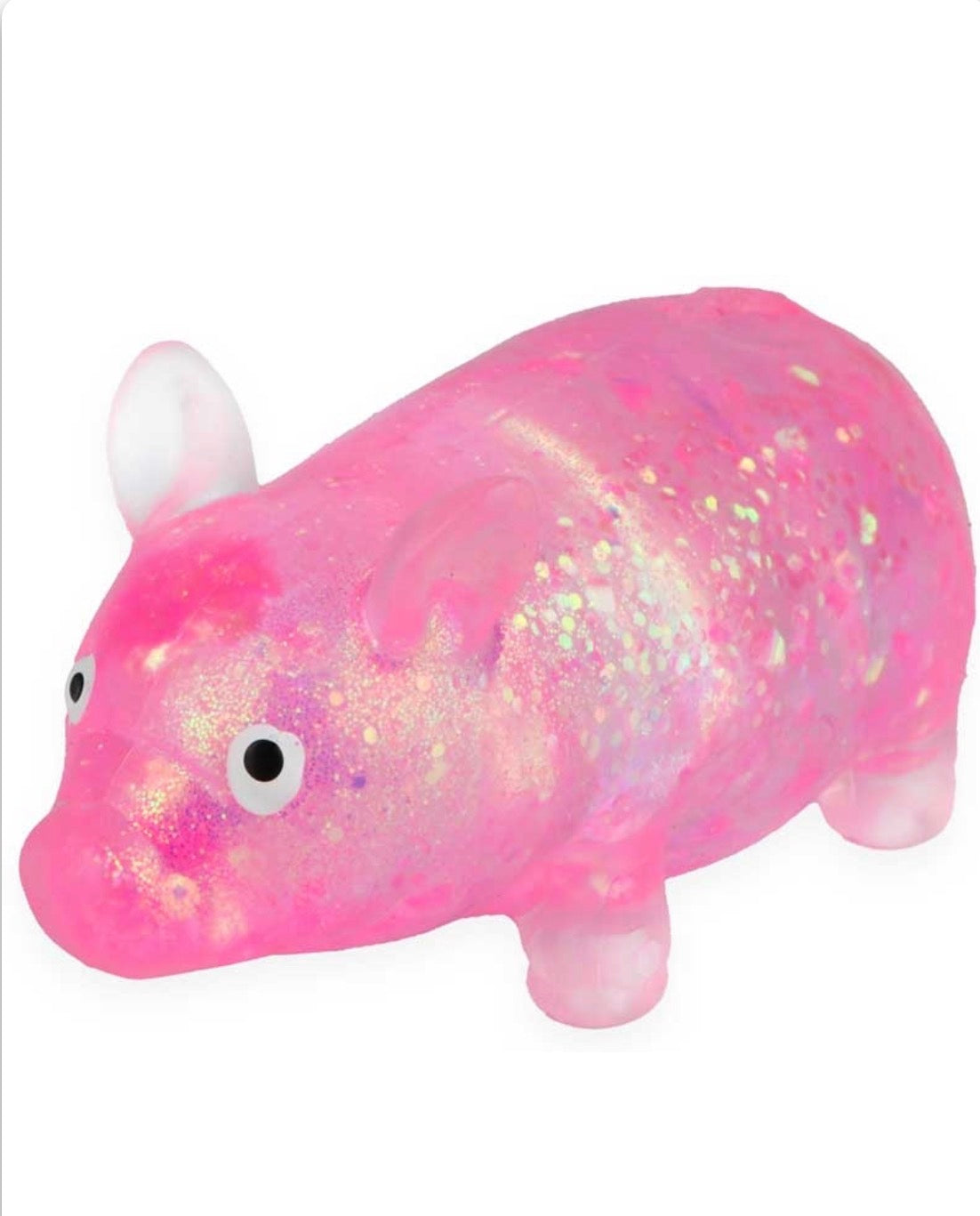 Pink pi toy with glittery texture on a white background