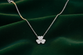 Shamrock Necklet on Green Background