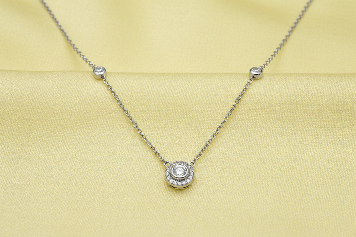 Silver CZ Necklet on Silk Yellow Background