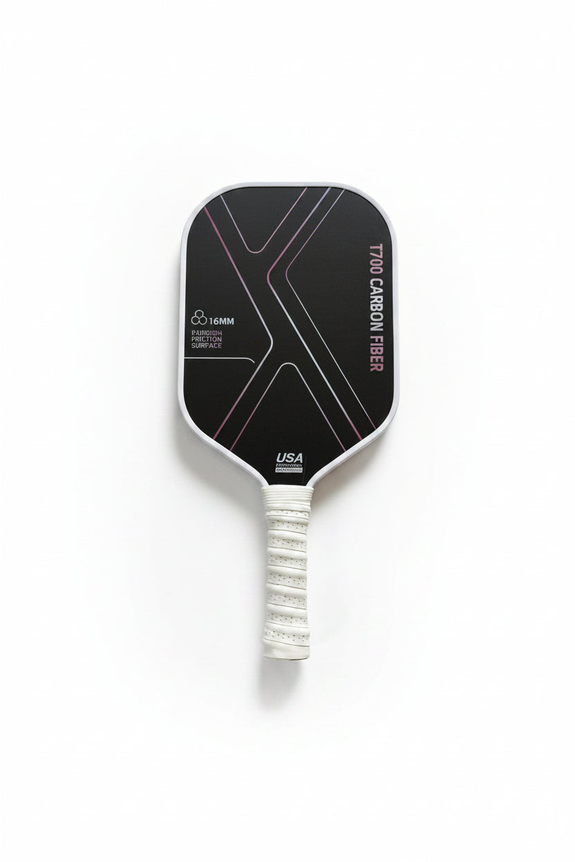 Black carbon fiber pickleball paddle on a white surface