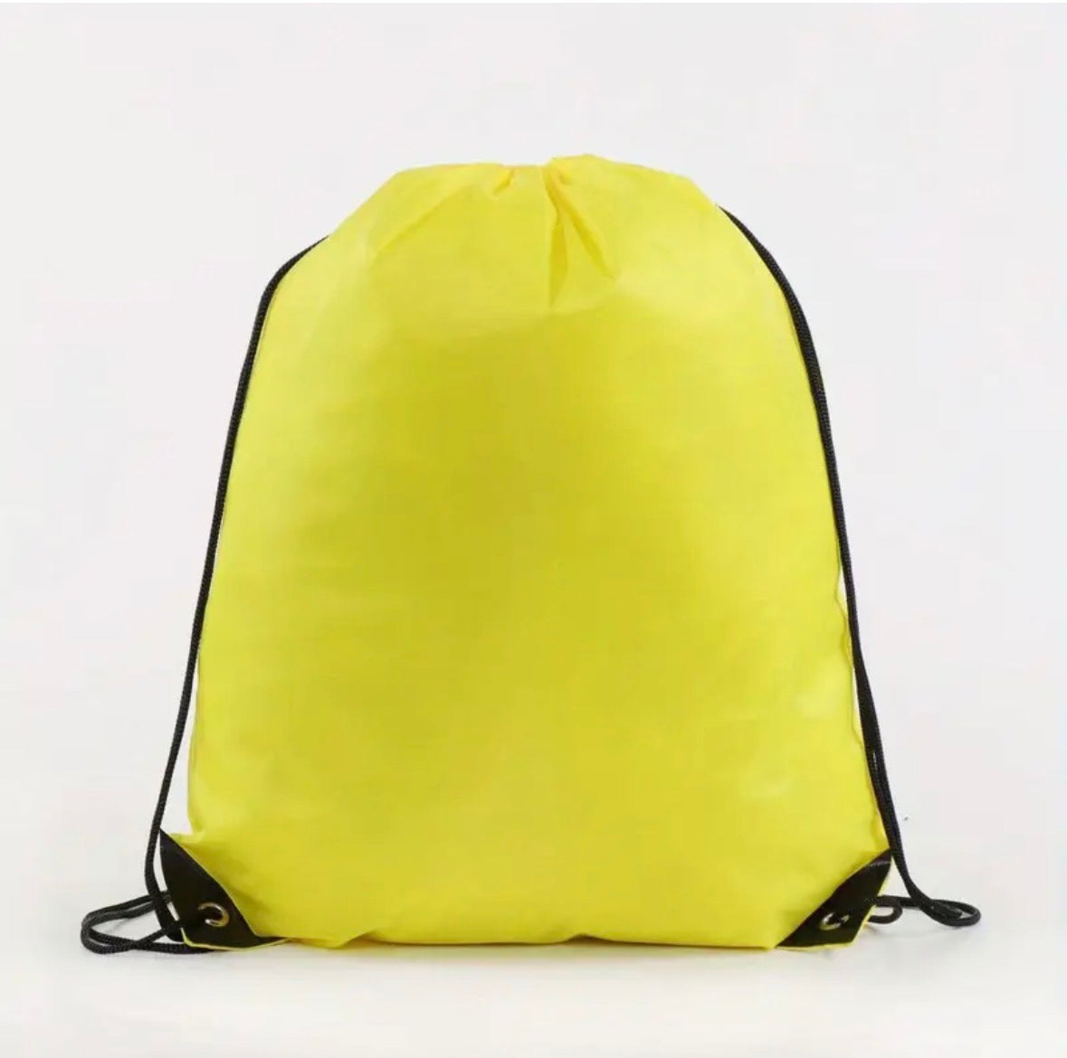 Yellow drawstring bag on a white background